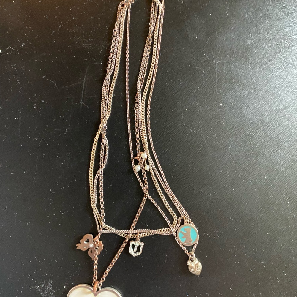 Elegant Gold and Silver Charm Necklace